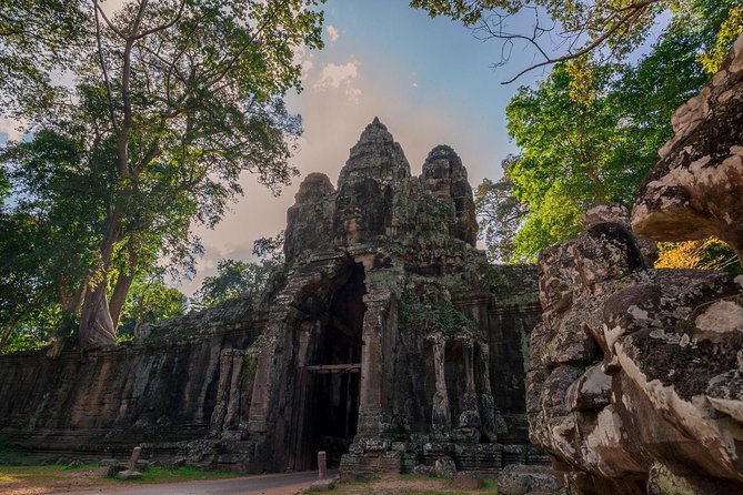1-Day Amazing Angkor Wat Tour with Sunset & All Interesting Major Temples - Ta Prohm and Ta Nei: famous roots, quieter stones