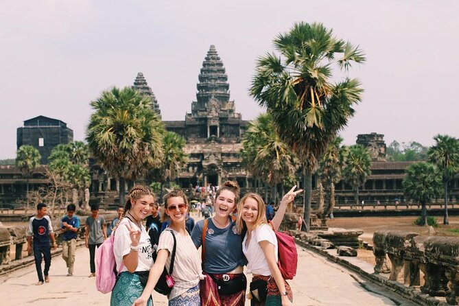 1-Day private Angkor Temple Tour with Sun Rise by Tuk Tuk from Siem Reap - Angkor Thom South Gate and the stone faces of Bayon