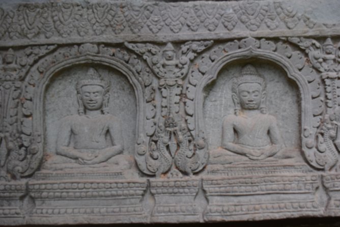 2-D Angkor temple tour with one sunrise in A/C vehicle and guide. - Day one: Ta Prohm, Pre Rup, and the outer temples