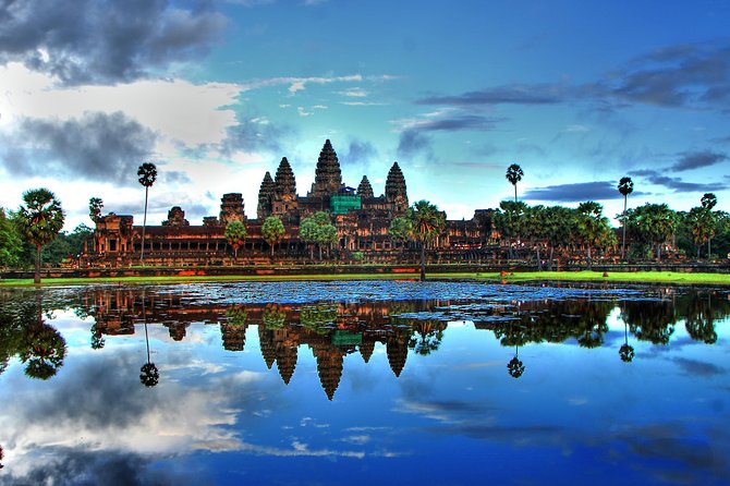 2-Day Angkor Wat & Tonle Sap Tour - Ta Prohm brings roots, ruins, and movie fame