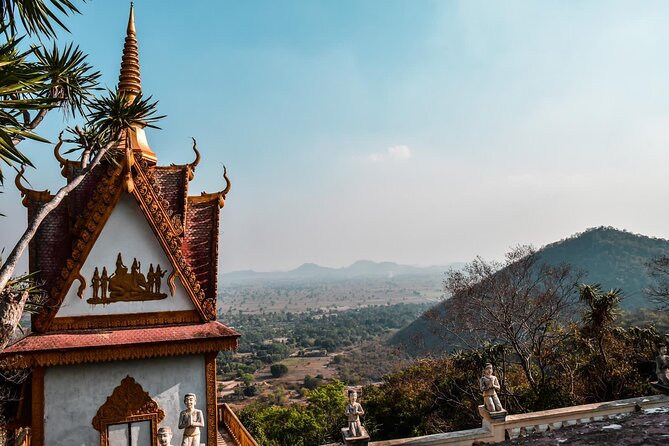 Afternoon tour by tuk tuk to bamboo train,bat cave,killing cave,countryside. - Riding Battambang’s original bamboo train