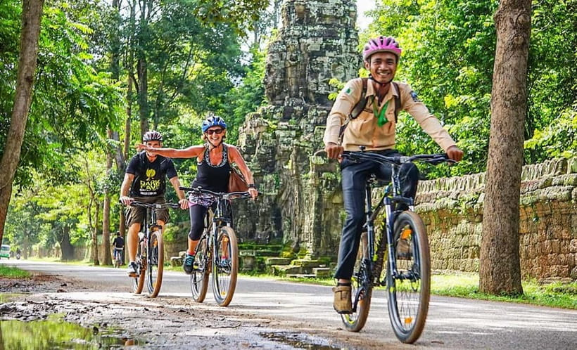 Angkor Bike tour & Gondola Sunset Boat - Riding behind Angkor Wat instead of joining the main crowd