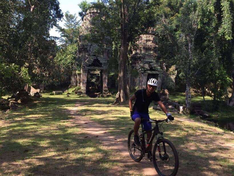 Angkor Cycling Tour - Angkor Wat by moat and forest path