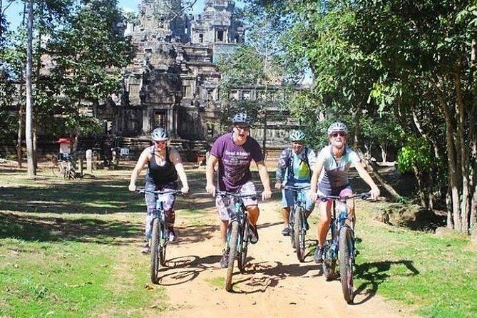 Angkor Sunrise Bike Tour with Breakfast & Lunch - Sunrise at Angkor Wat sets the tone