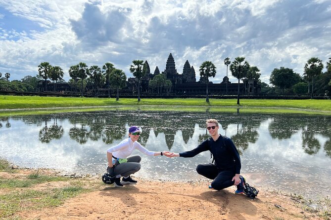 Angkor Sunrise Bike Tour with Lunch Included - Ta Prohm by a route intended to miss the crowds