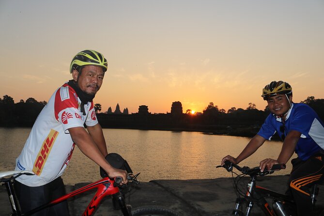 Angkor Sunrise Expedition Cycling Through Serene Backroads - Ta Prohm by village roads and wooded tracks