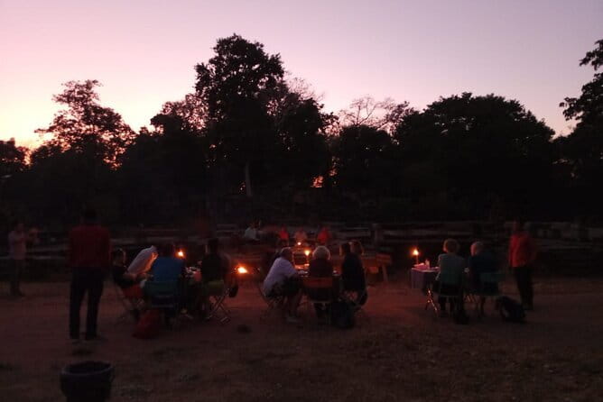 Angkor Wat Cycling Tour - Bayon Temple and the face towers of Angkor Thom