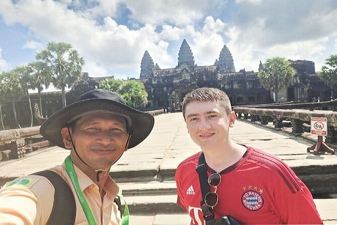 Angkor Wat Cycling Tour With local Tour Guide from Siem Reap - Angkor Thom and the faces of Bayon