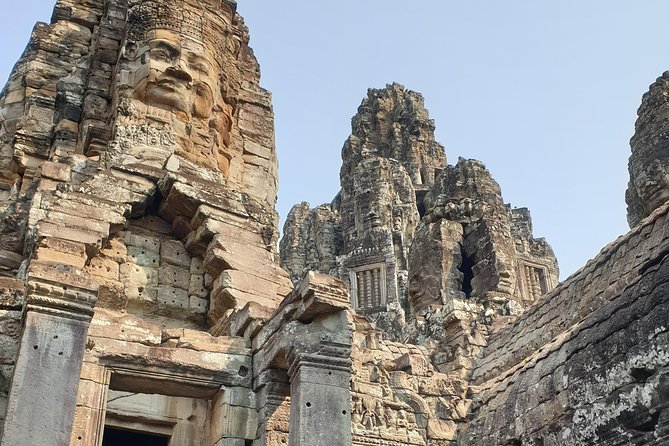 Angkor Wat Full Day Tour in Siem Reap Small-Group - Bayon’s smiling faces reward a slower look