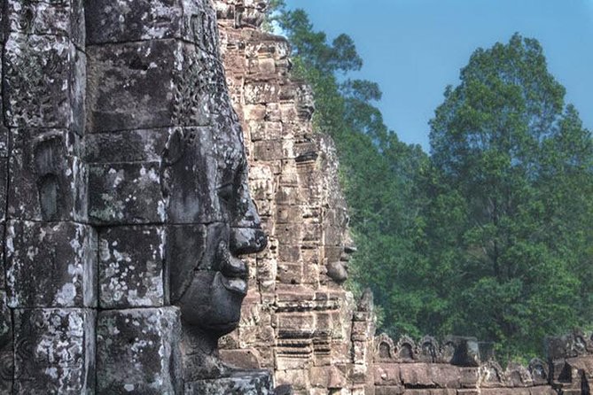 Angkor Wat highlight Tour From Sunrise -Small Group - Bayon’s smiling towers and carved galleries