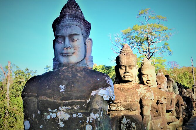Angkor Wat Highlights and Sunrise Guided Tour from Siem Reap - Bayon and the giant stone faces
