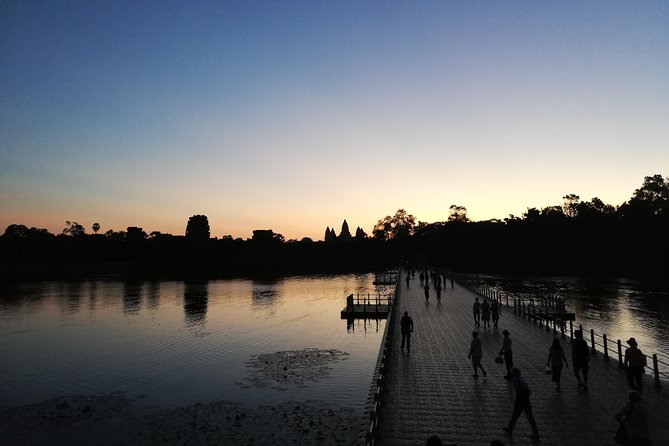 Angkor Wat Private Driver Tours to Angkor Wat Sunrise, Angkor Thom & Ta Prohm - Moving through Angkor Thom