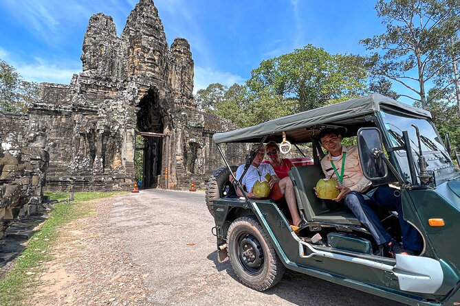 Angkor Wat Sunrise and Market Tour by Jeep - Angkor Thom, two hours among royal monuments