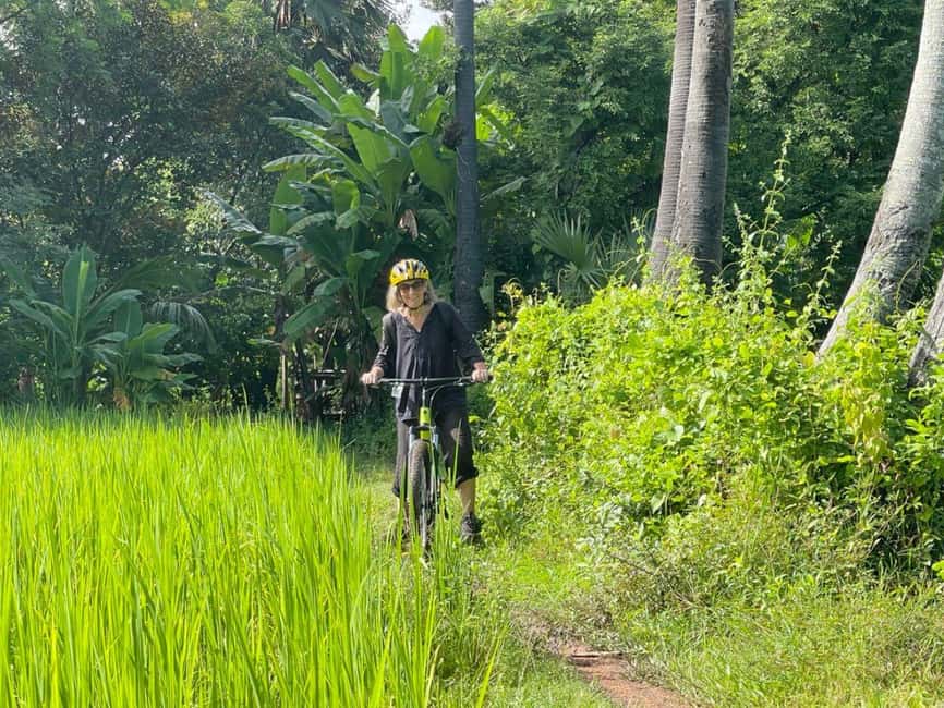 Angkor Wat Sunrise Bike Tour with Monk Blessing & Lunch - Entering Angkor Thom through the South Gate
