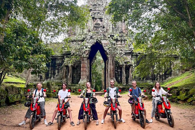 Angkor Wat Sunrise Tour By E-Bike Experience With Breakfast Included - Ta Prohm, where the trees take over
