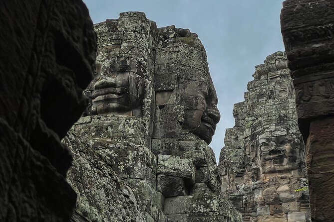 Angkor Wat Sunrise Tour By E-Bike Experience With Breakfast Included - Through Angkor Thom to the smiling Bayon