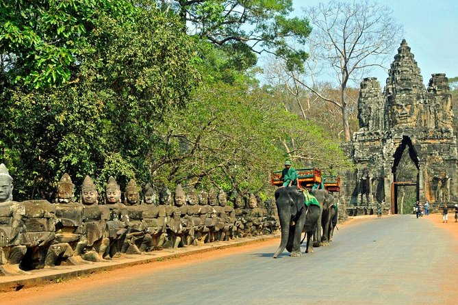 Angkor Wat Sunset Tour - Angkor Thom and Bayon: the royal city and its stone faces