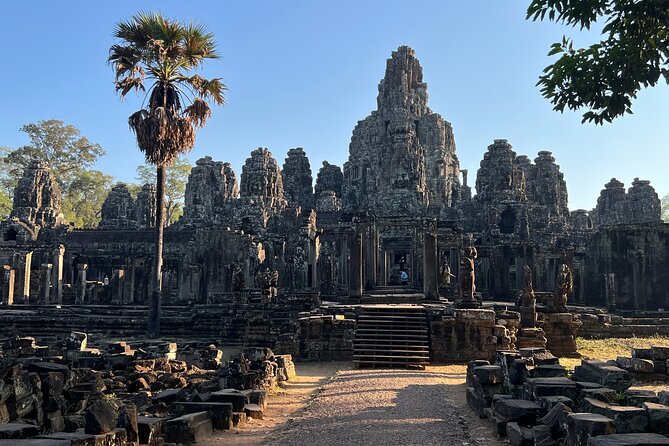 Bangkok to Angkor Wat 2 Days 1 Night by Flight - Bayon and the many stone faces of Angkor Thom