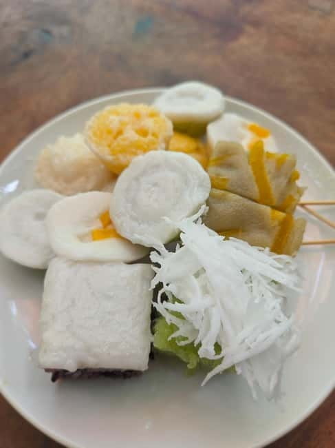 Battambang: Morning Tuk Tuk Food Tour of Our Iconic Dishes - Nom banh chok beside a stilted home