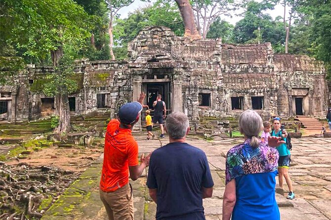 Cycling of the Angkor Temples include Lunch & Snacks - Ta Prohm and the trees over the stone