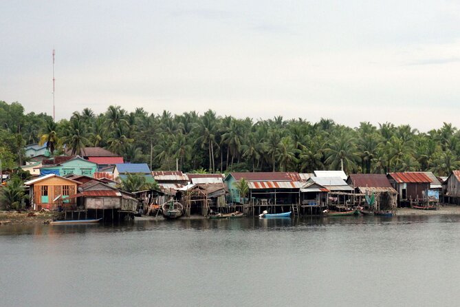 discover floating villages and tonle sap lake by boat - The crocodile and fish farm raises hard questions