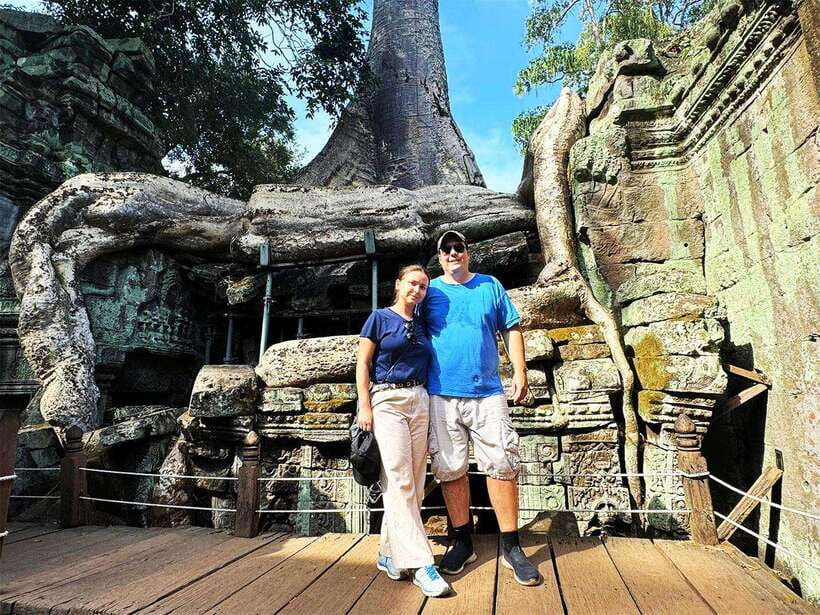 Explore Angkor Temple Sunset With Tour Guided - Ta Prohm, where trees take over the ruins