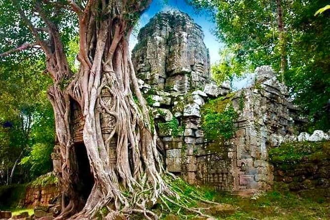 Explore Angkor Wat Sunrise Small Tour Private VIP Car - Angkor Thom and the smiling faces of Bayon