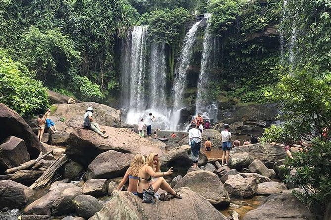 Exploring Angkor Wat Surise Angkor Thom Bayon TaPromh Small Group - Ta Prohm, where trees grip the stone