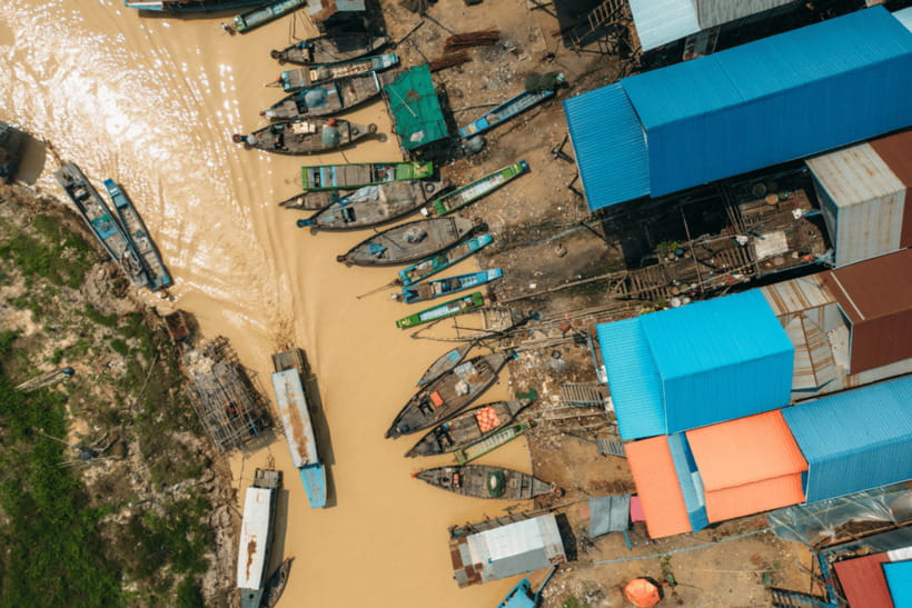 Floating Village Tour with Khmer Meal & Beer - A local market stop before the longer cruise