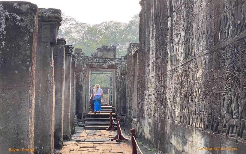 From Phnom Penh: Angkor Wat, Bayon, and Ta Prohm Day Trip - Heat, walking, and who should book