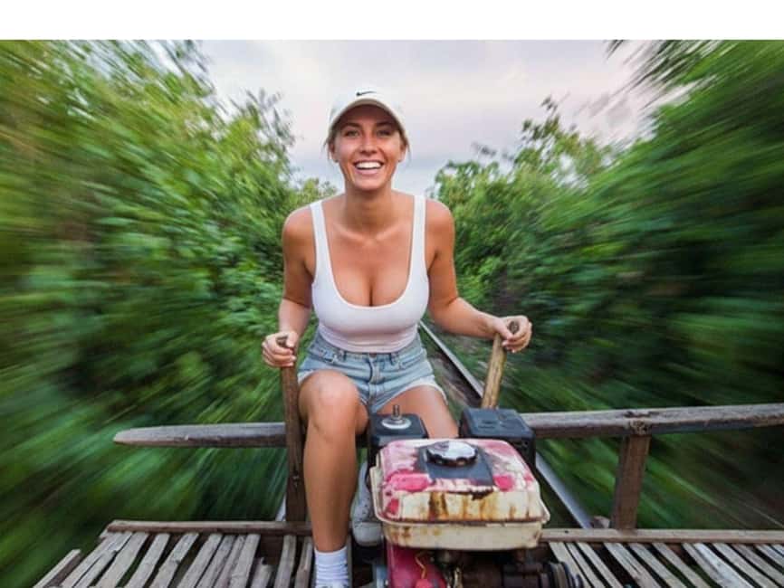 From Siem Reap: Battambang Day Trip Bamboo Train & Bat Cave - Central Market: a practical look at local life