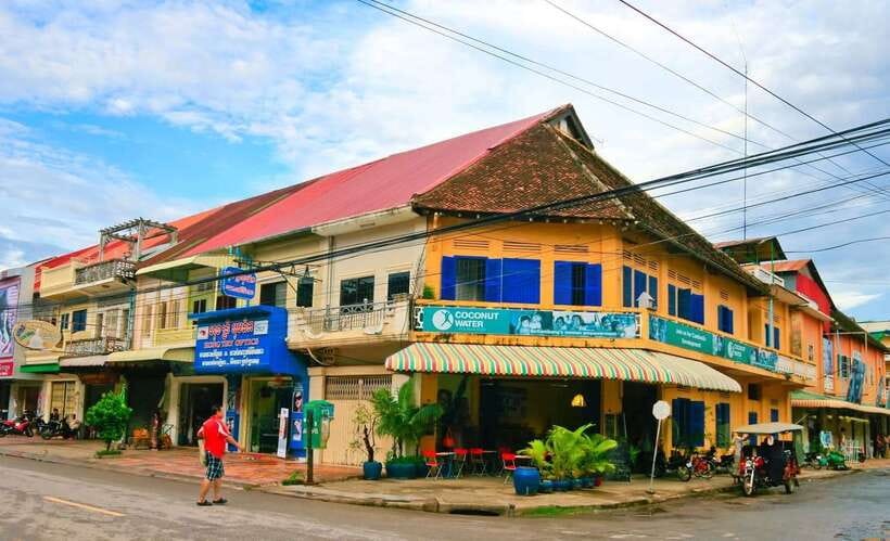 From Siem Reap: Battambang Day Trip Bamboo Train, Bats Cave - Colonial Battambang through photographs and costumes