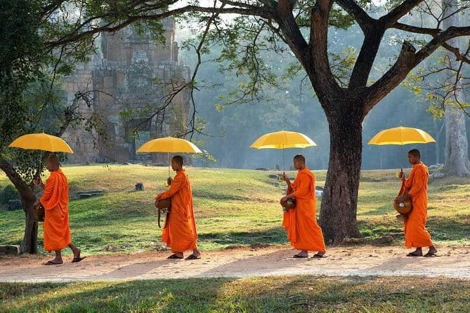 Full Day Small Group Tour & Sunset in Angkor Area from Siem Reap - Phnom Bakheng sunset means a final climb