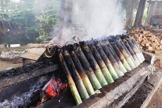 Grand Tour-Ek Phnom. Baset. Bamboo Train. Wat Banan. Phnom Sampov - Riding the Bamboo Train for one hour