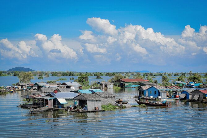 Guided Floating Village Boat Tour in Siem Reap - Boarding the traditional long-tail boat