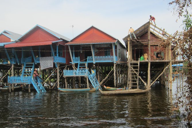 Half Day Floating Village (Kampong Phluk) & Tole Sap Lake Tour - Arriving among Kampong Phluk’s tall houses