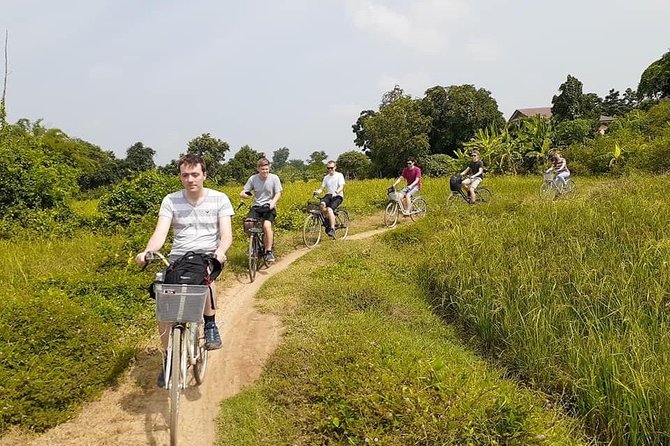 Half day morning bicycle tour to Explore local livelihood and test local snacks - Wat Samrong Knong and Cambodia’s difficult past