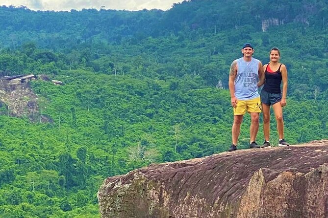 Jungle Trekking Tour at Phnom Kulen National Park from Siem Reap - A waterfall pause beside the linga river