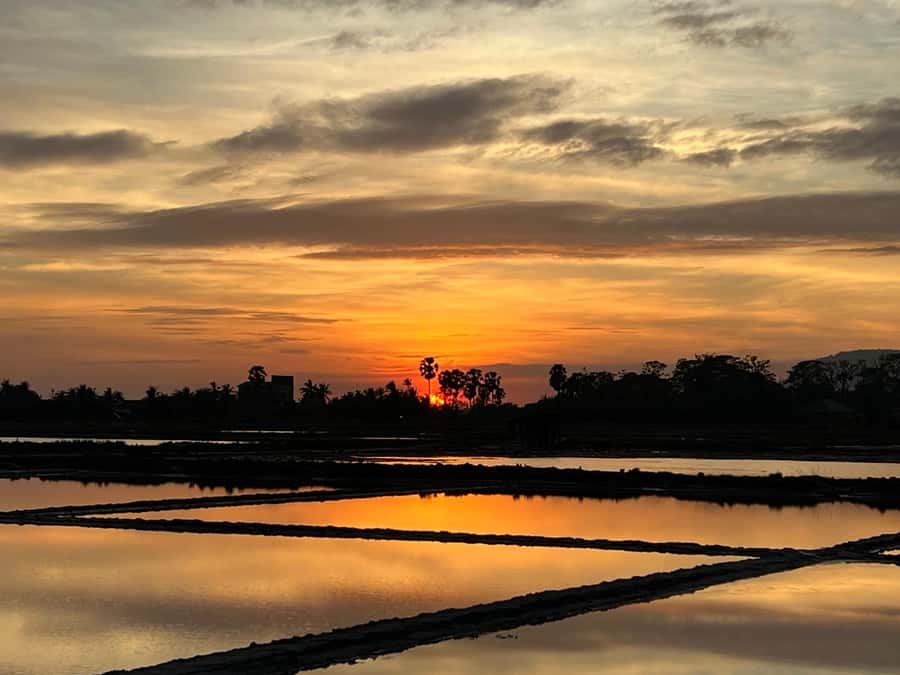 Kampot Countryside include Pepper farm, Salt field & Lake - Salt fields, working methods, and sunset reflections