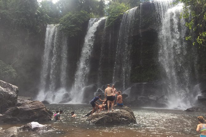 Kulen Mountain (Waterfall) & Kampong Phluk Floating Village Tour - Cooling off under the Kulen waterfall