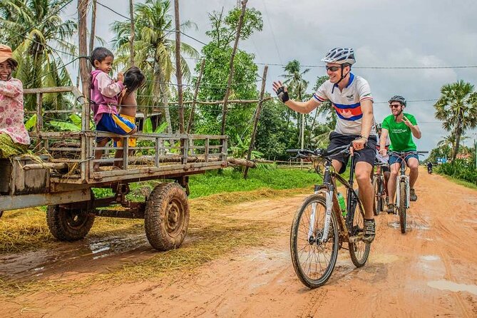Magical Mekong River Island Biking Tours - Crossing the Mekong by ferry