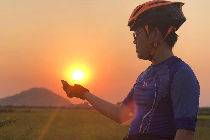 One Day tour with sunrise in car with A/C or Van & Guide. - Bayon and the Faces of Angkor Thom
