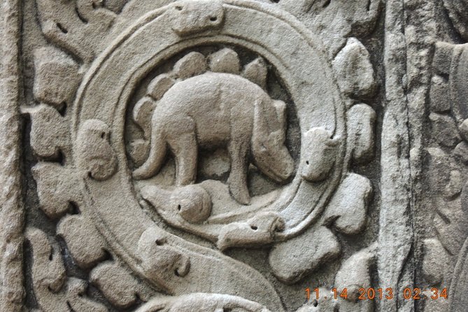 One Private Full Day Guided Tour to Angkor Wat - Angkor Thom’s smiling Bayon faces
