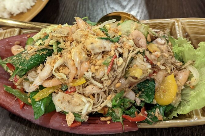 Phnom Penh Authentic Evening Food Tour 100% By Local - The Royal Palace stop serves rice pancakes