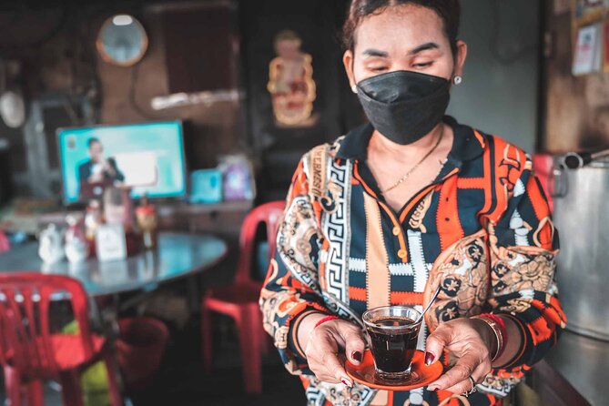 Phnom Penh Morning Market & Food Tour by Tuktuk - Includes All Food & Drinks! - Street-side pork and rice with Brother Salin