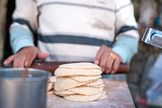 Phnom Penh Morning Market & Food Tour by Tuktuk - Includes All Food & Drinks! - Trying Cambodia’s yellow turmeric crepes