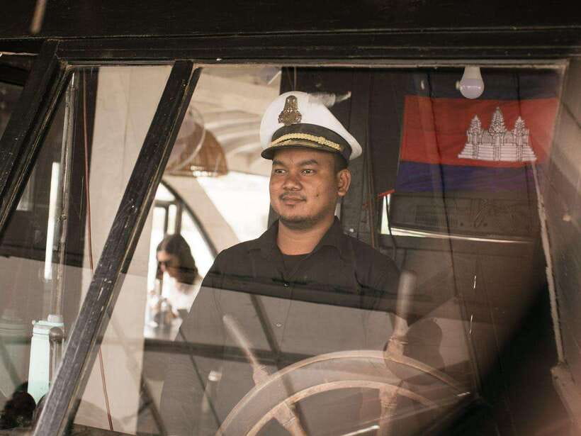 Phnom Penh: Sunset Cruise on Kanika Boat - Crossing onto the Mekong as the light fades