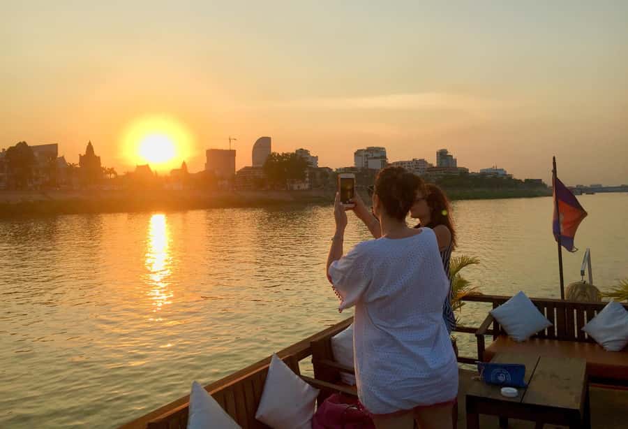 Phnom Penh: Sunset Cruise with Unlimited Beer &Fruit platter - The river junction and four-way geography