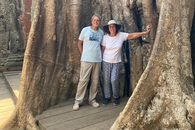 Siem Reap: 1 Day Angkor Wat + Sunrise Private Tour with Tuk-Tuk - Ta Prohm, where trees frame the ruins