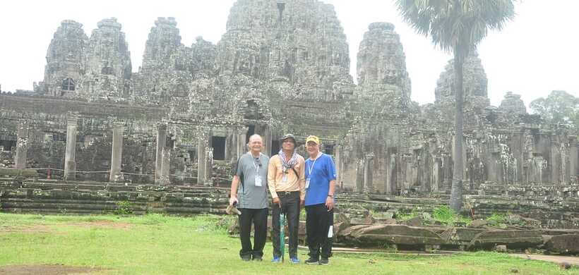 Siem Reap: Angkor Wat and Floating Village Day Tour - Bayon and its famous stone faces
